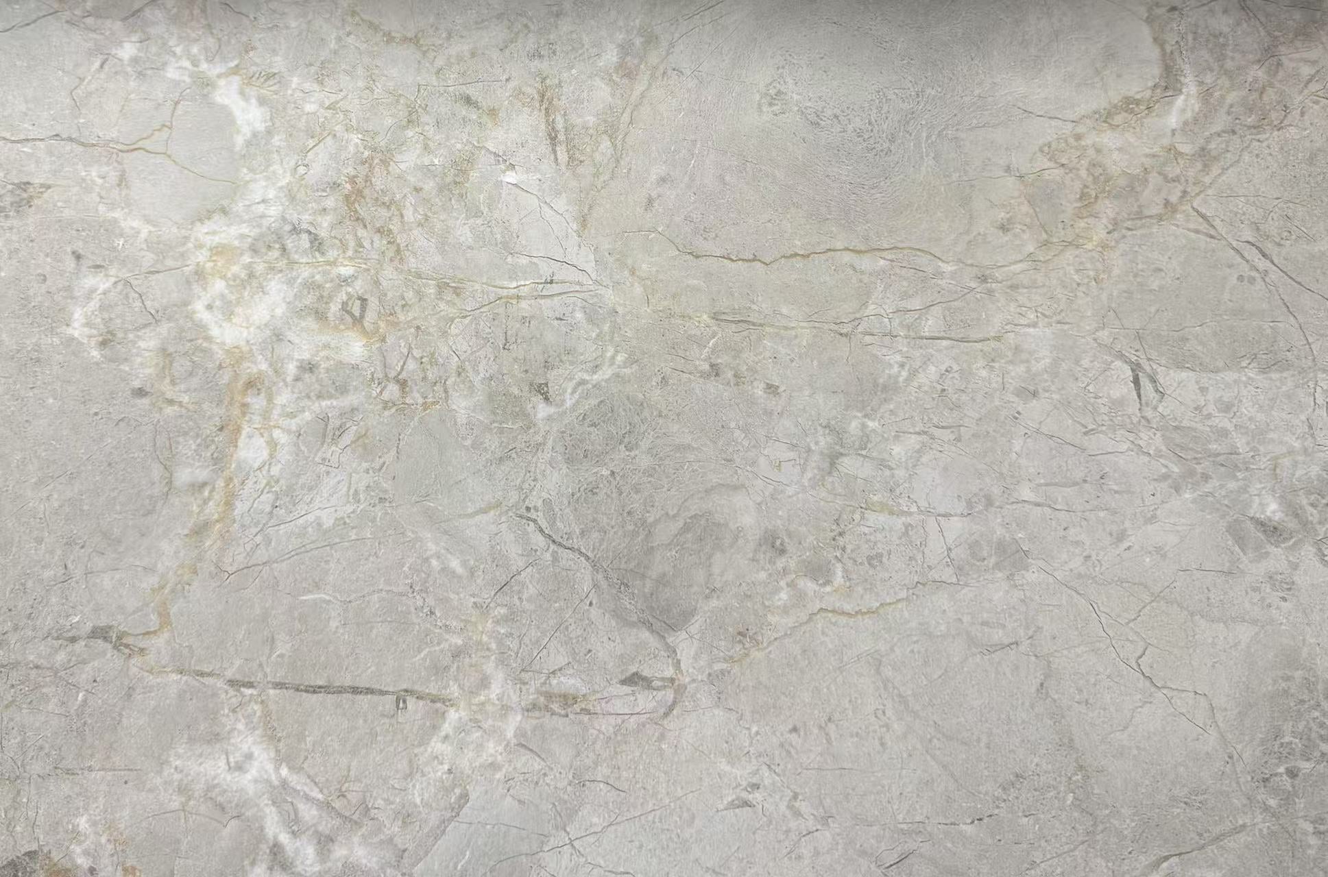 Close-up of a gray marble-like surface with veining