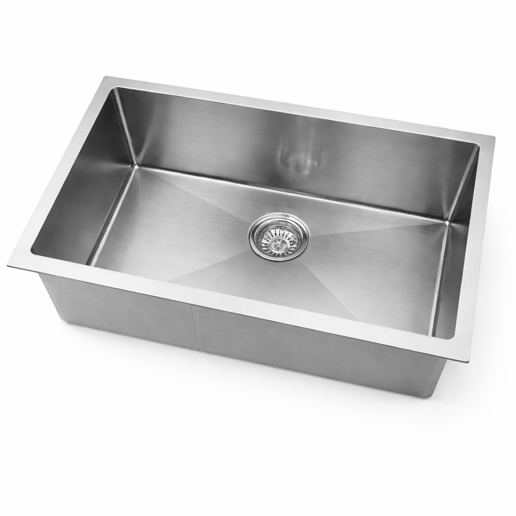 Stainless steel kitchen sink on a white background