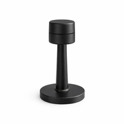 Black cylindrical object on a white background
