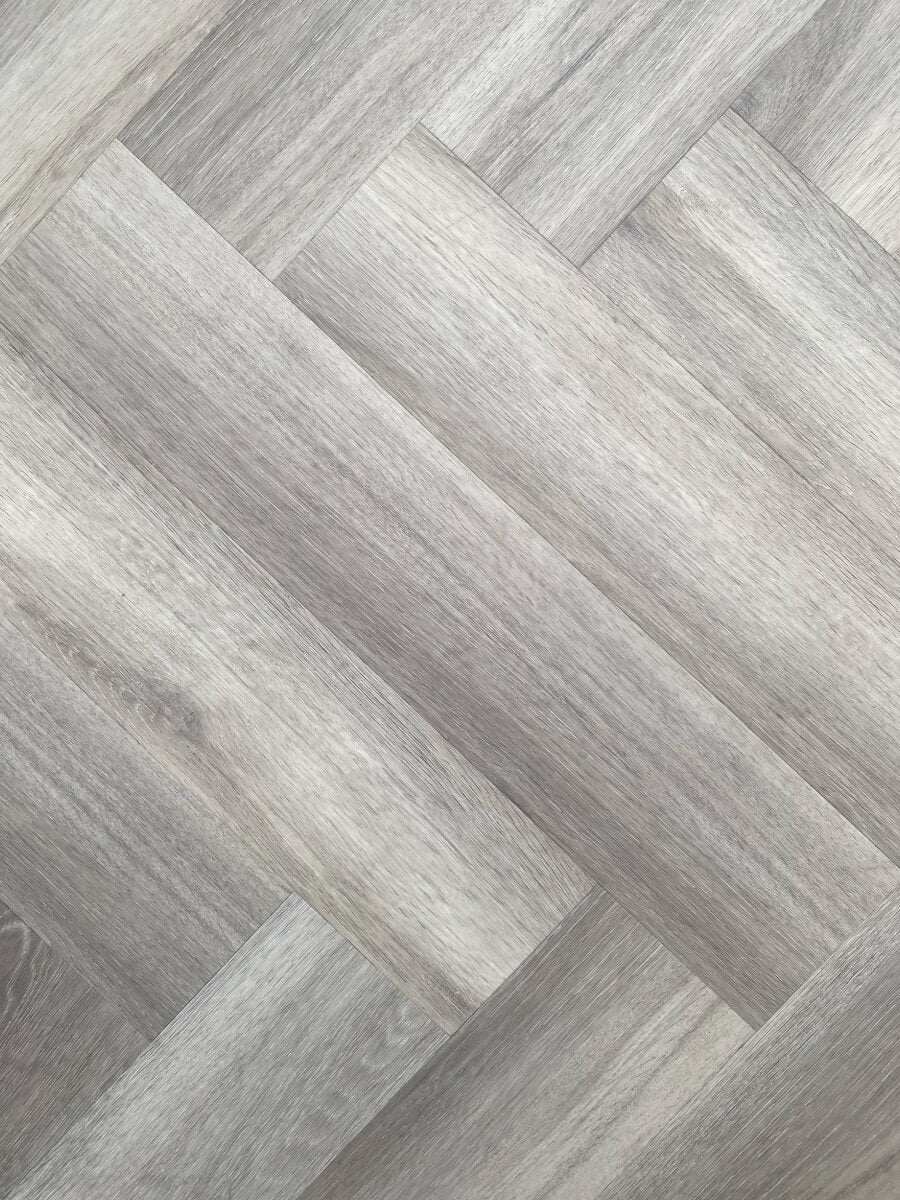 Obsidian Estate Grey Oak waterproof hybrid herringbone flooring product image