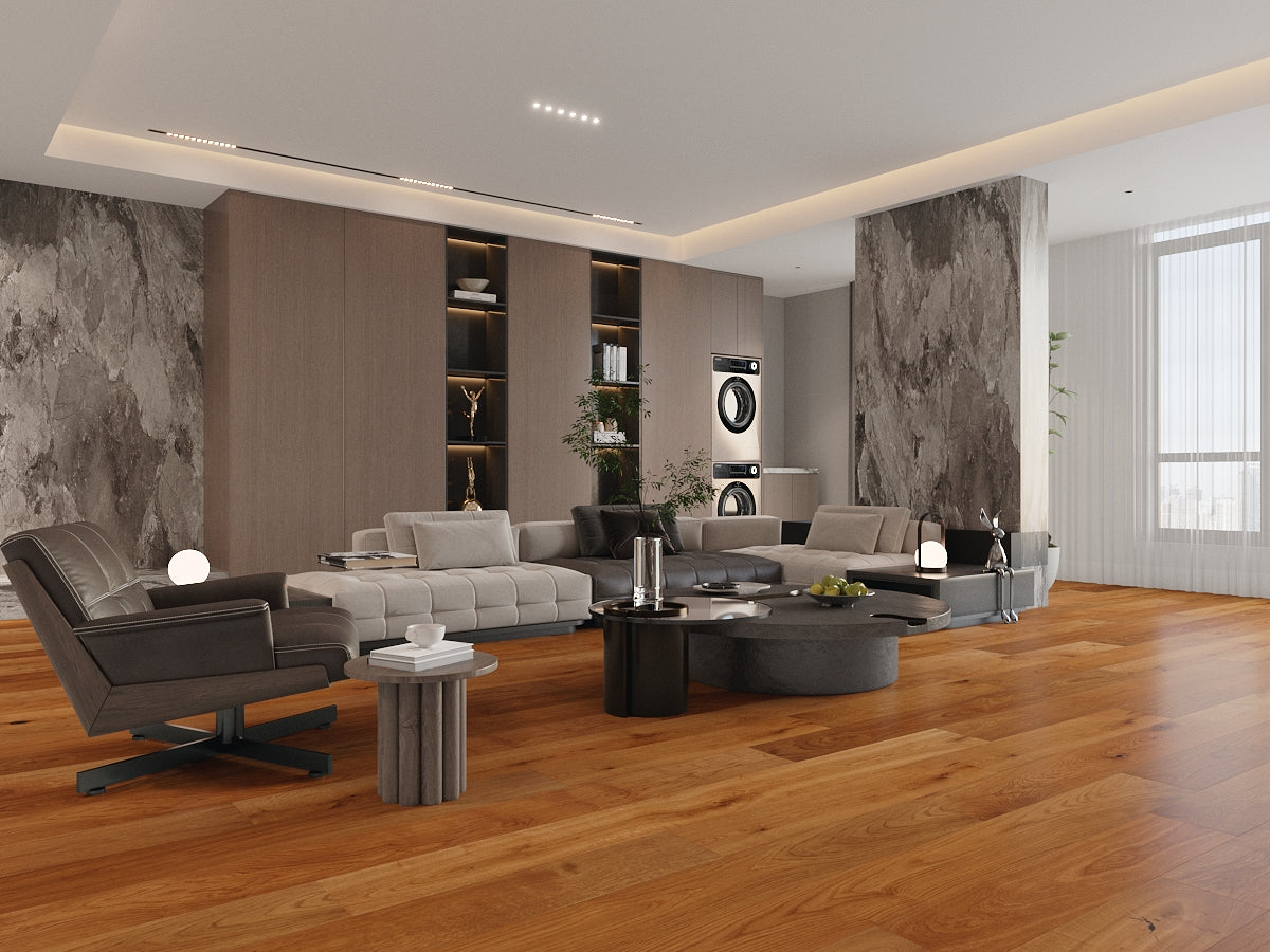 Modern living room with gray sofa, chairs, and coffee table on a wooden floor.