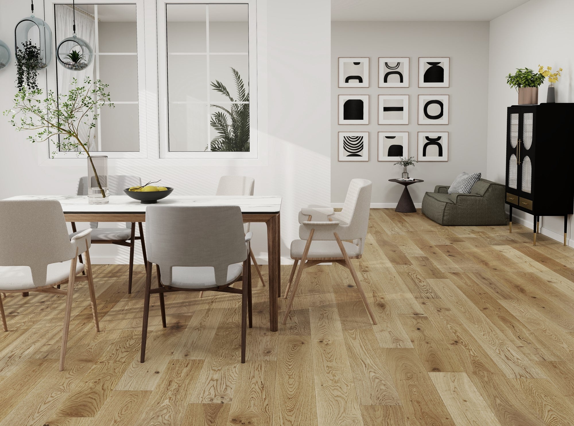 Modern dining room with wooden flooring, table, chairs, and decor.