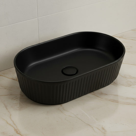 Black rectangular basin with ribbed texture on a white background