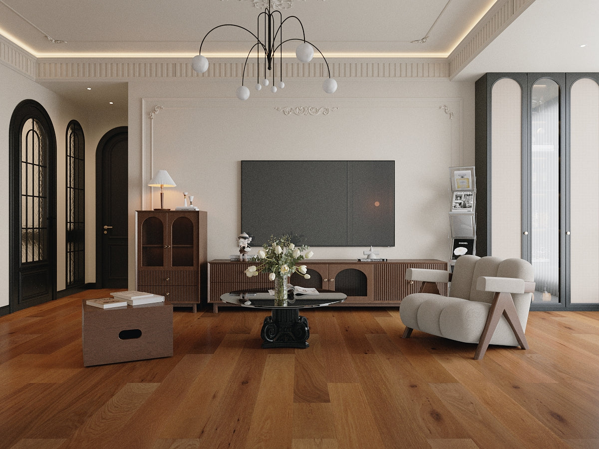 Modern living room with wooden floor, white walls, and stylish furniture.