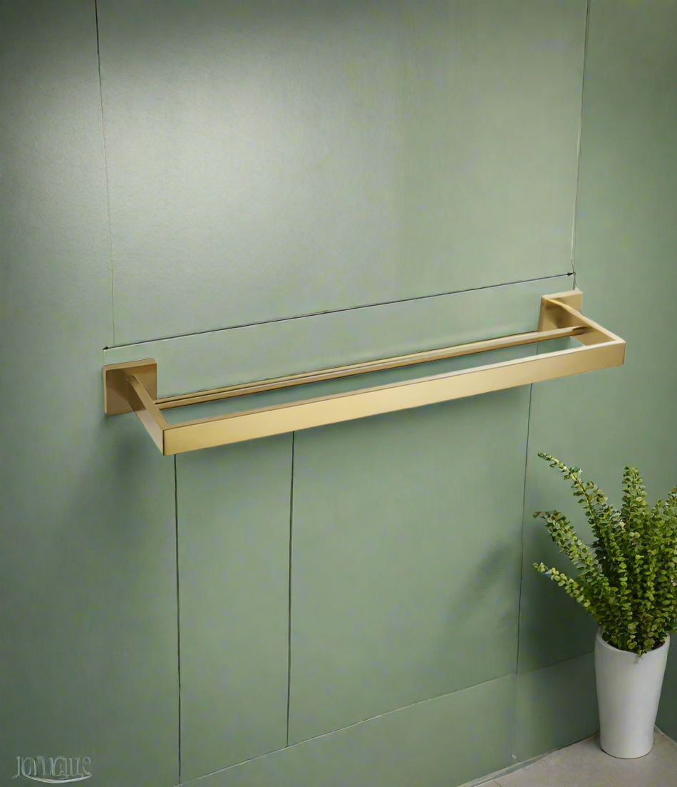 A black square double towel rail rack mounted on a white wall with a gray towel hanging on it, and a plant to the left.