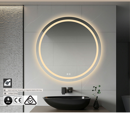 Round illuminated mirror in a modern bathroom setting with a black sink.