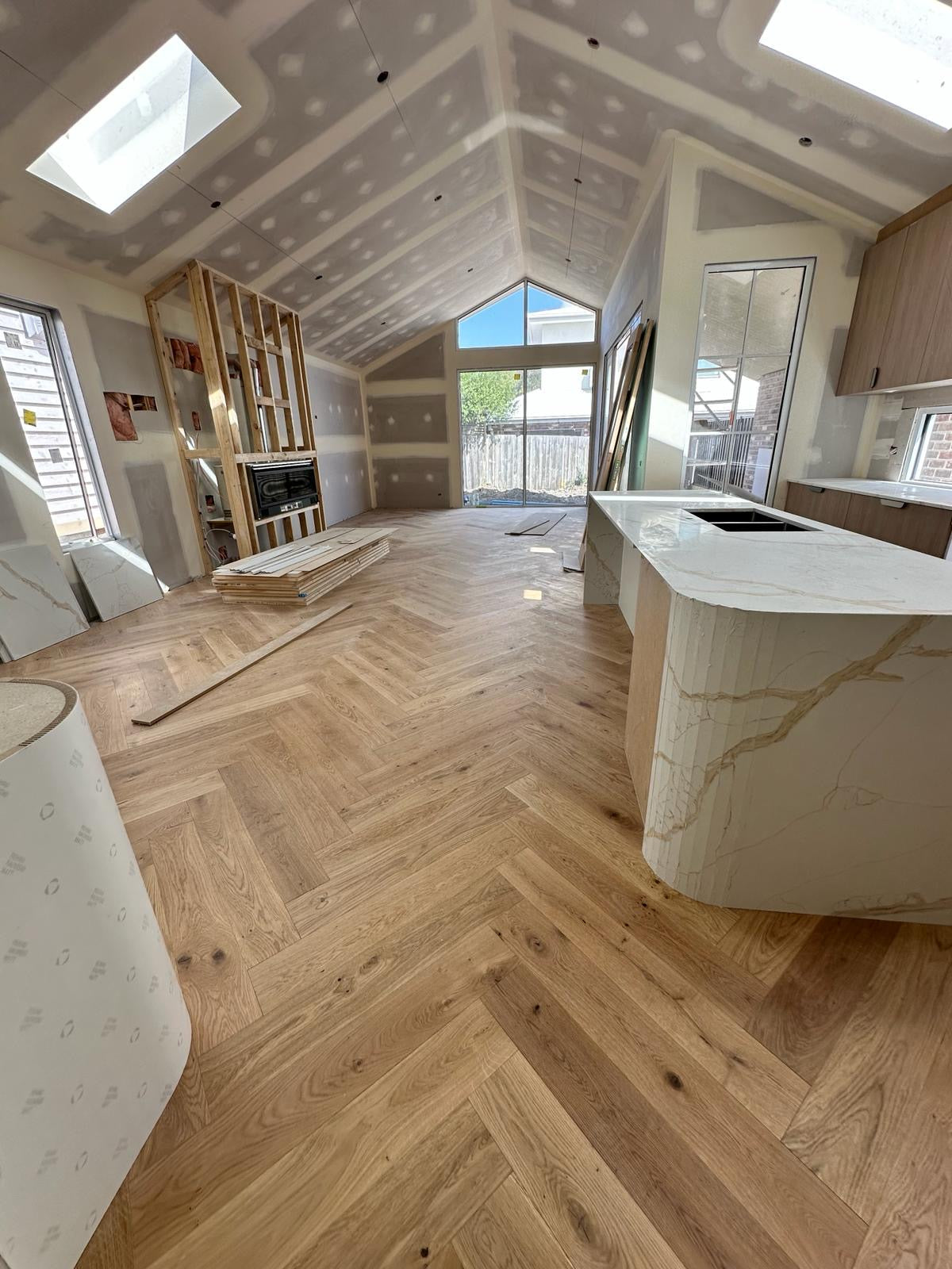 Natural Oak Herringbone Engineered Timber Flooring 14mm installed in a contemporary interior