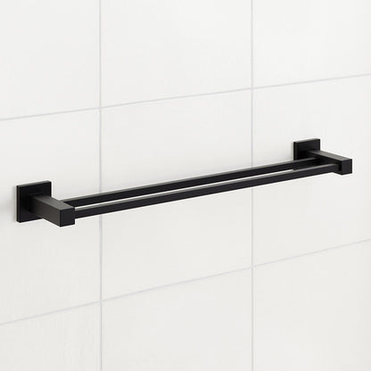 Black towel bar mounted on a white tiled wall