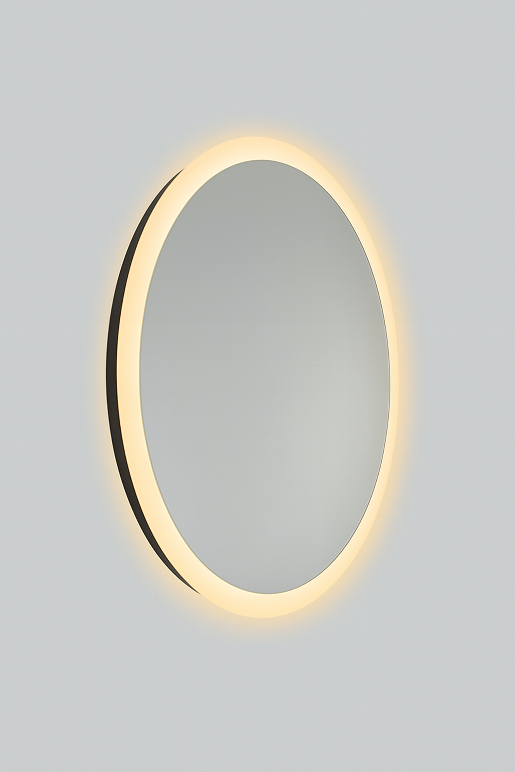Elegant wall-mounted mirror with a glowing frame on a gray background
