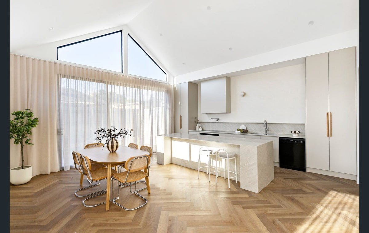 Smoked Oak Hybrid Herringbone Flooring 7mm installed in a contemporary interior