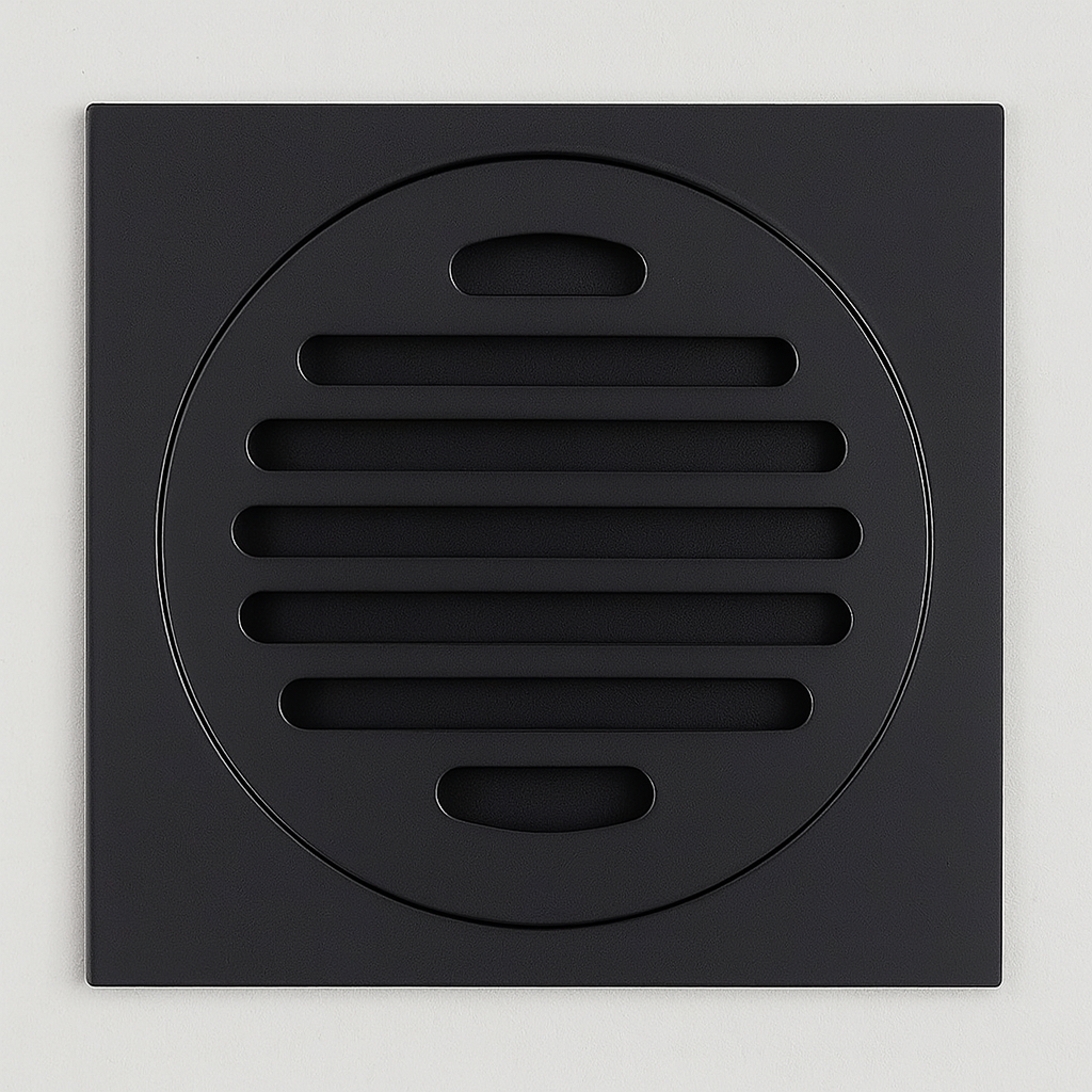 Black square drain cover with circular center on a light gray background
